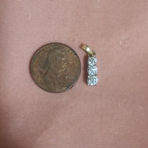 Diamond and 14k,2 tone past present future pendant